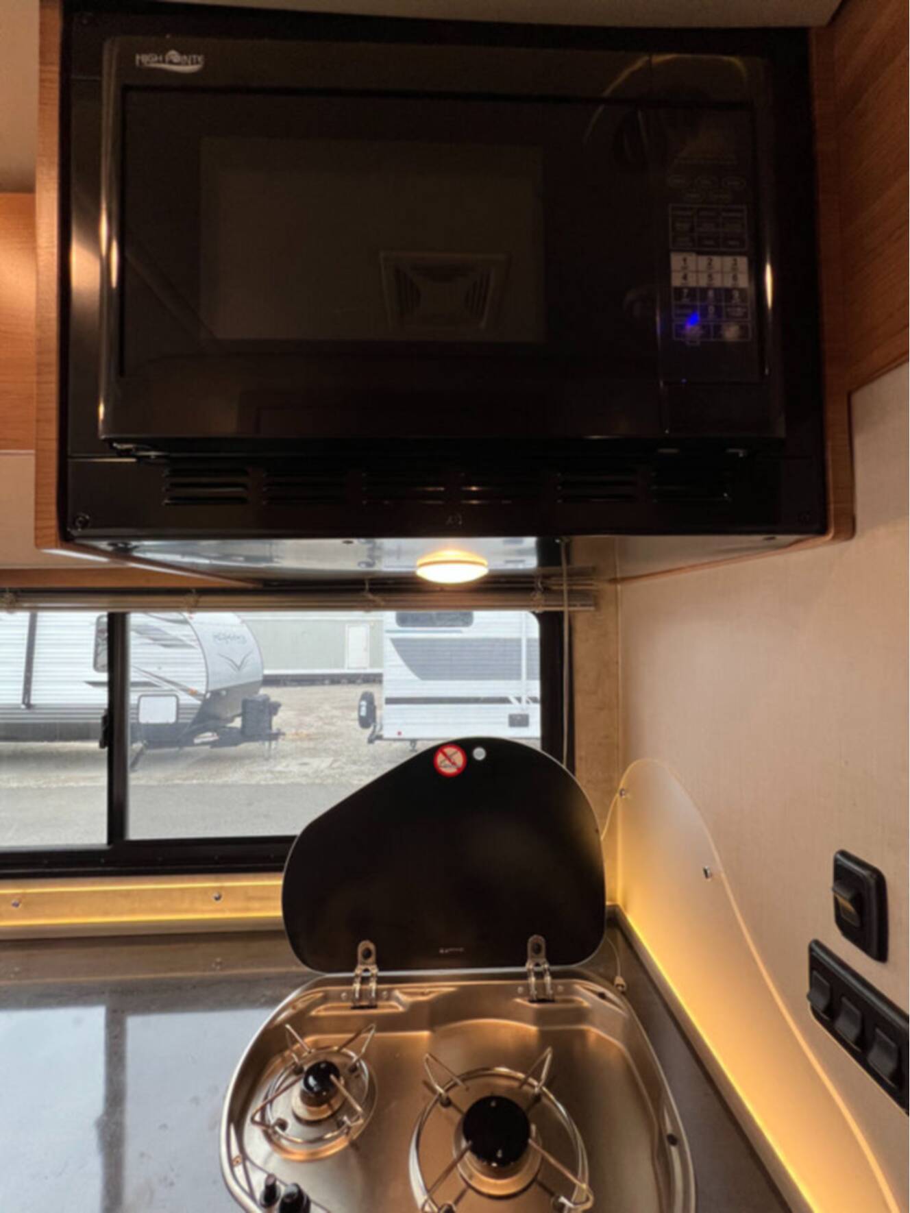 A photo of this 2015 Winnebago Navion 24G
