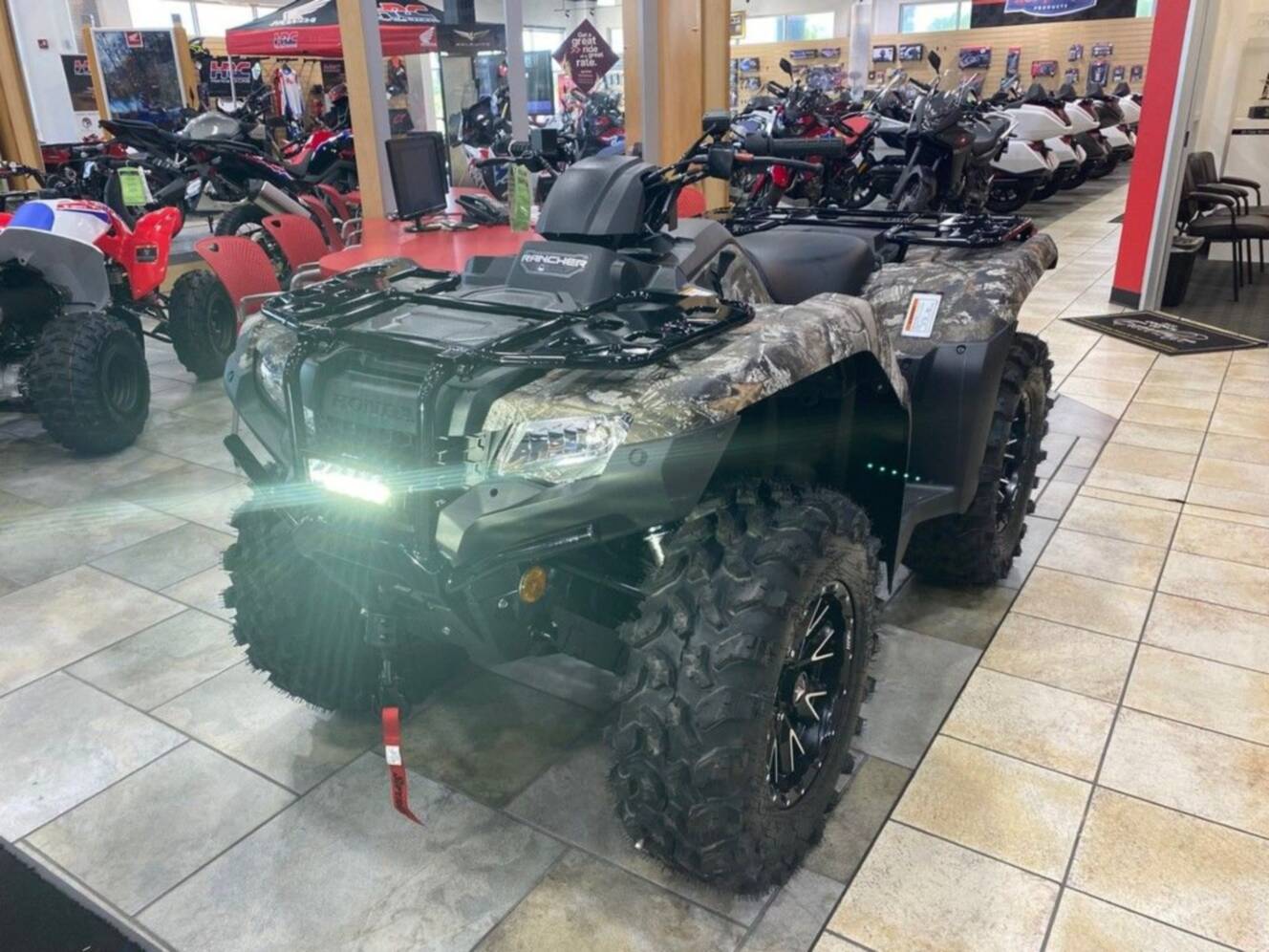 A photo of this 2027 Honda® FourTrax Rancher 4X4 TrueTimber® Atera Camo