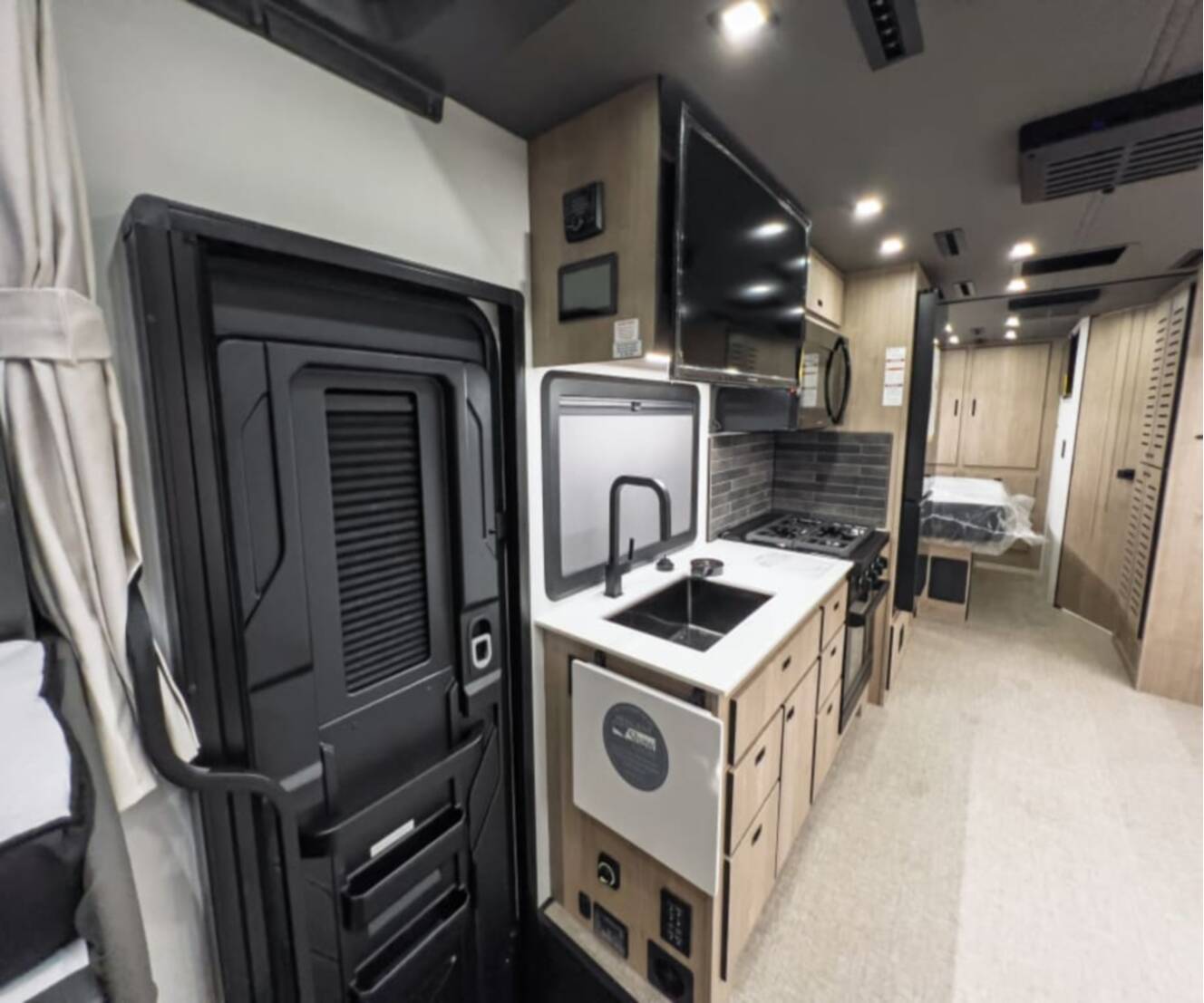 A photo of this 2027 Grand Design LINEAGE SERIES F 31ZW-FBP