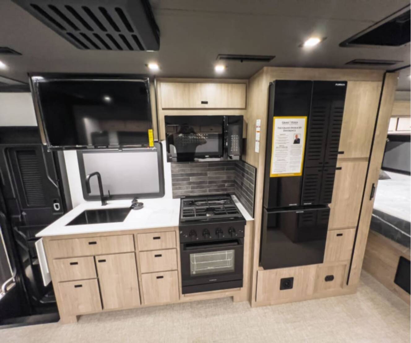 A photo of this 2027 Grand Design LINEAGE SERIES F 31ZW-FBP