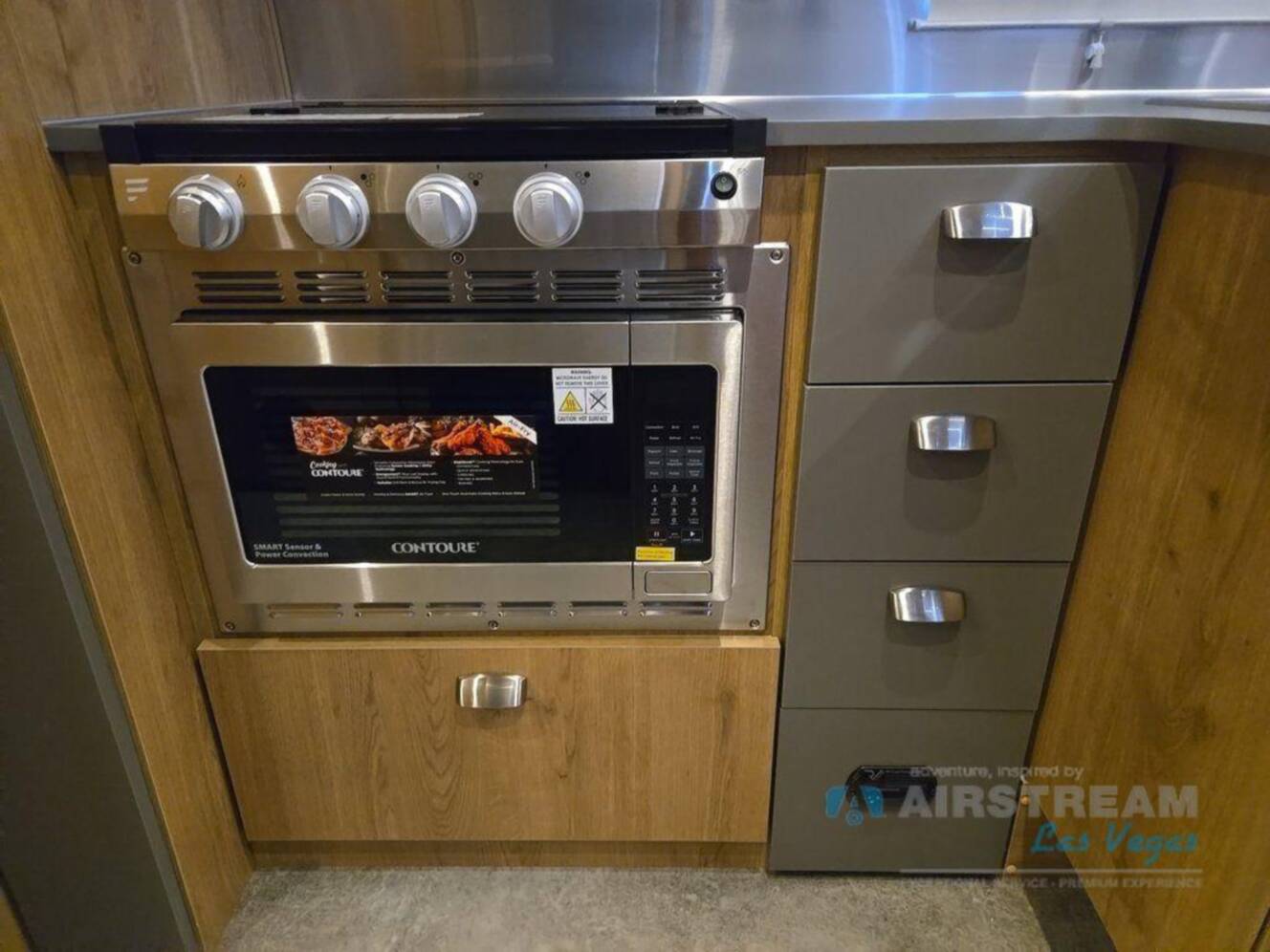 A photo of this 2026 Airstream Trade Wind 25FBQ Hatch
