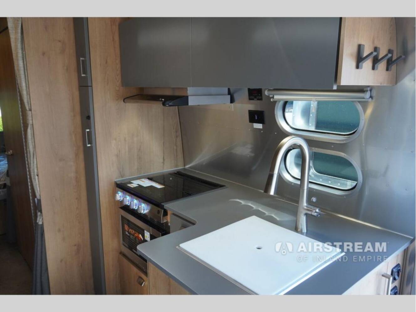 A photo of this 2026 Airstream Trade Wind 25FBQ Hatch