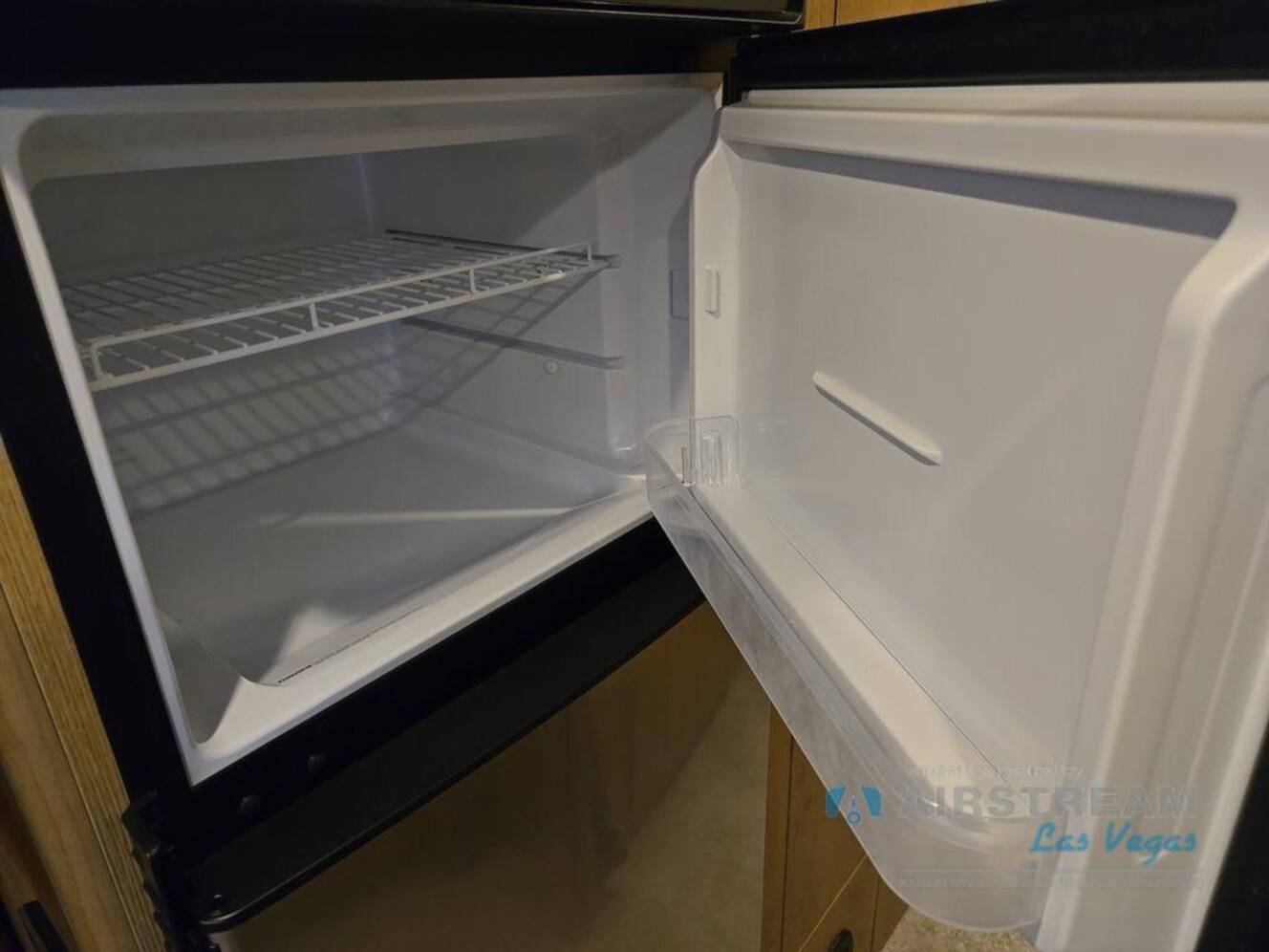 A photo of this 2026 Airstream Trade Wind 25FBQ Hatch