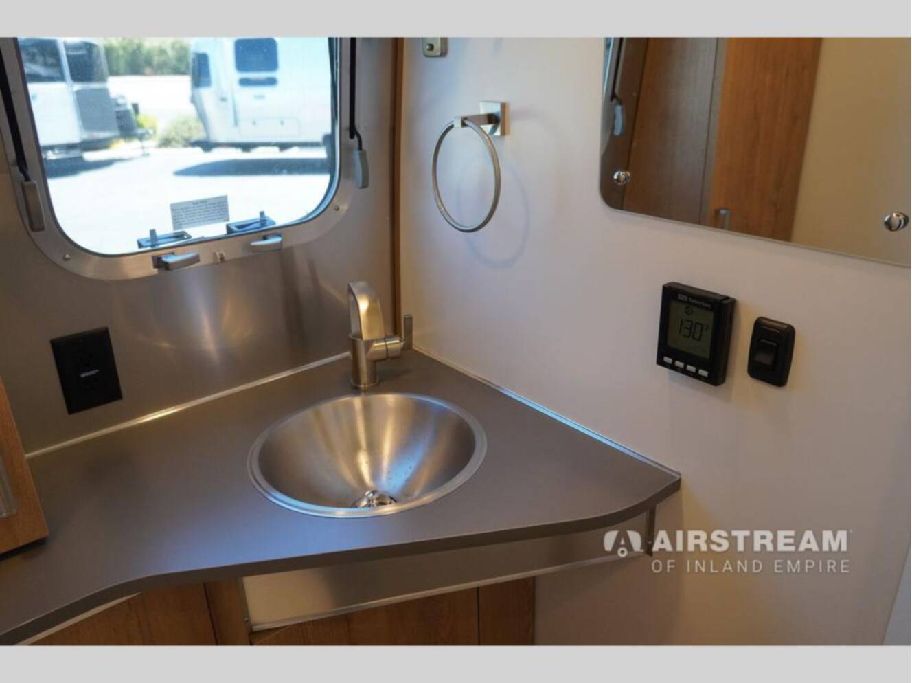A photo of this 2026 Airstream Trade Wind 25FBQ Hatch