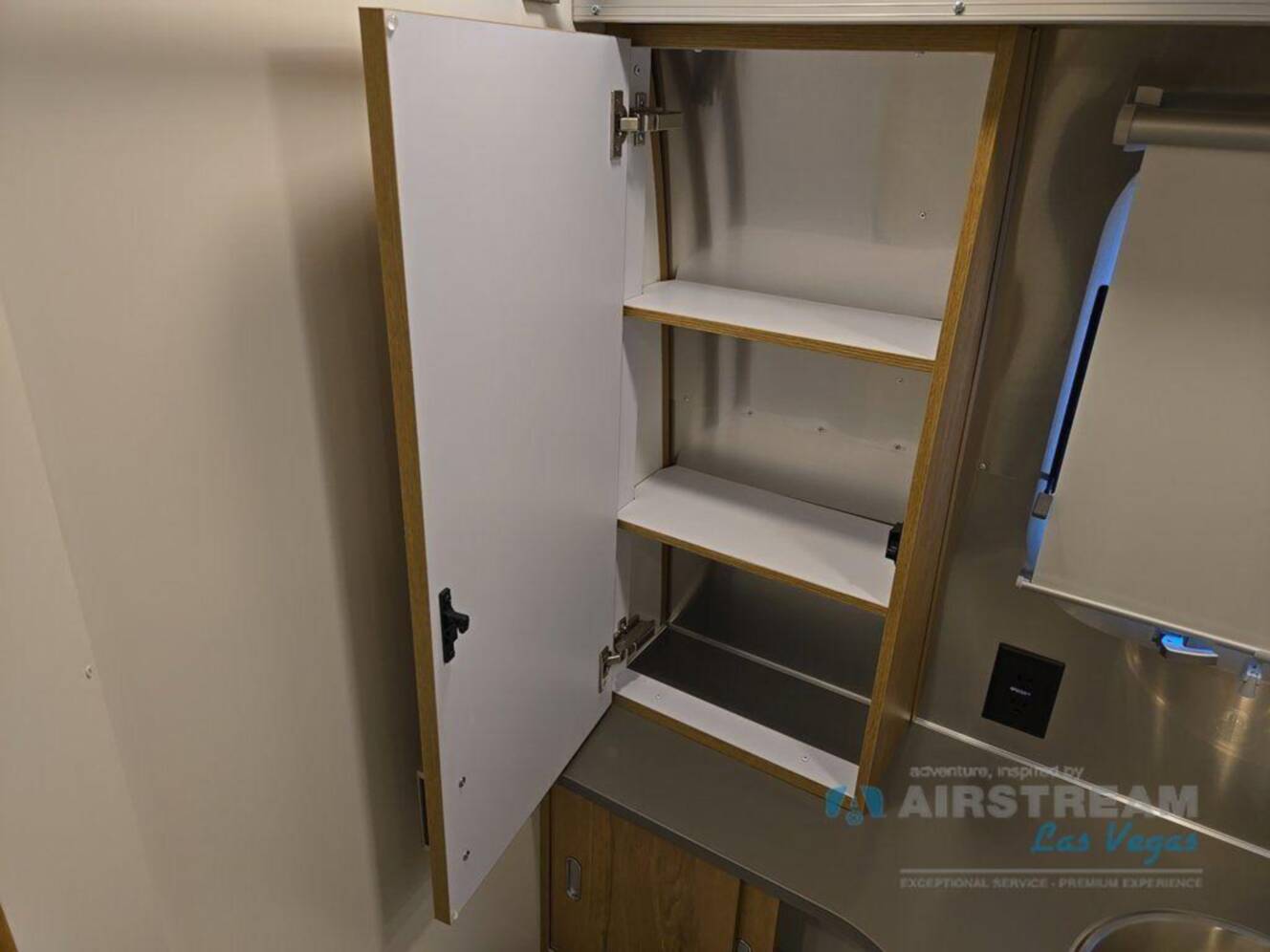 A photo of this 2026 Airstream Trade Wind 25FBQ Hatch