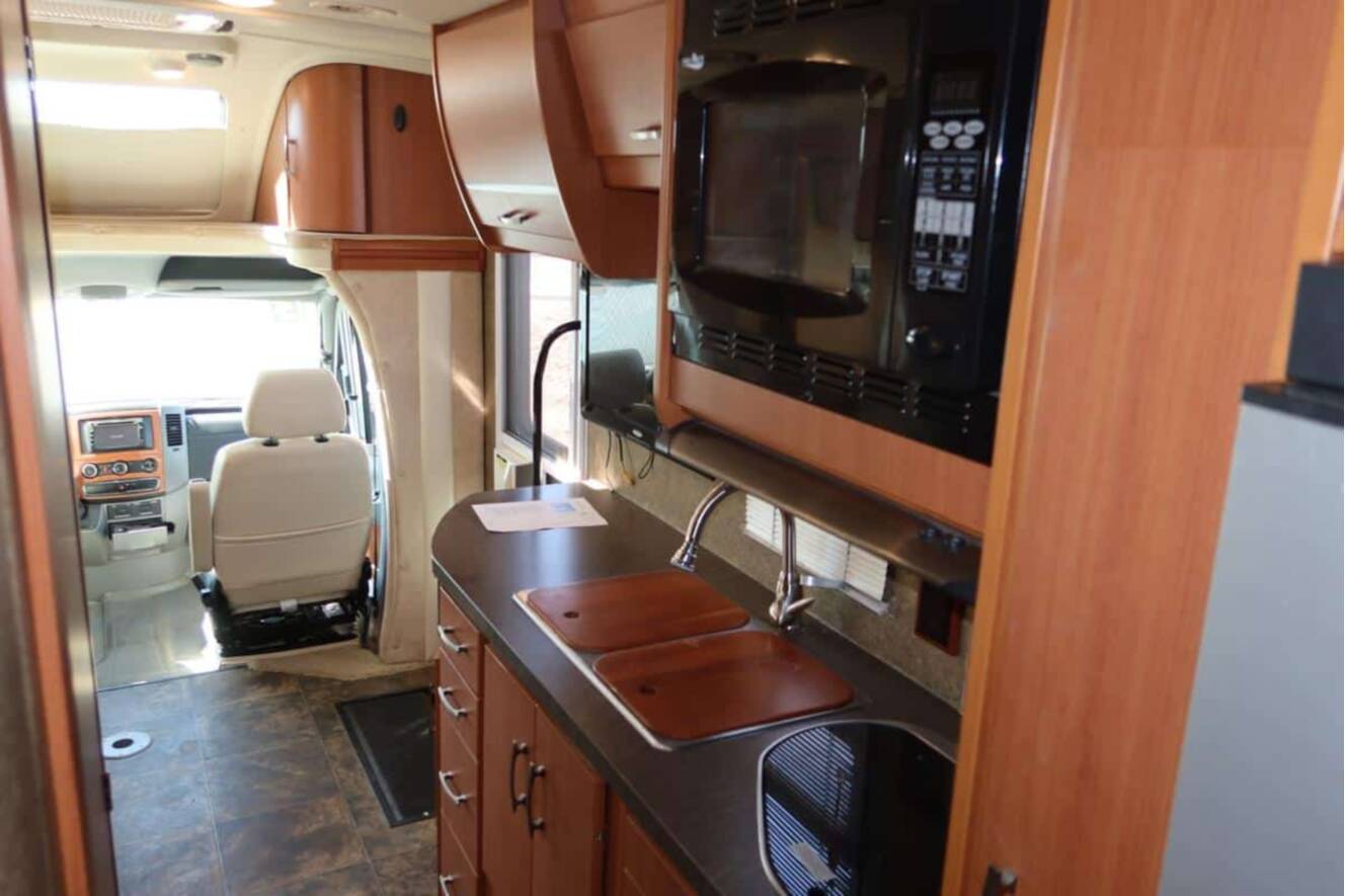 A photo of this 2013 Itasca NAVION IQ 24G