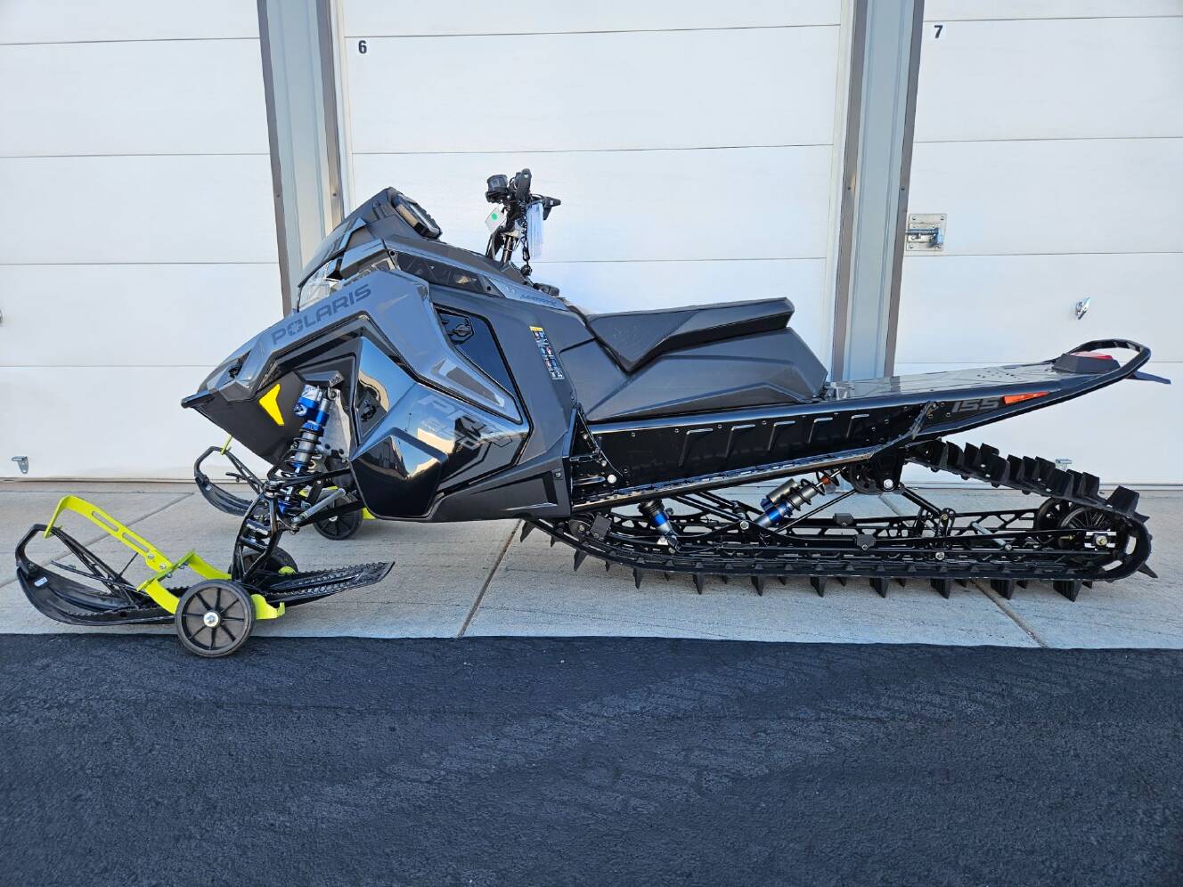 A photo of this 2025 Polaris 850 PRO RMK 155 SC