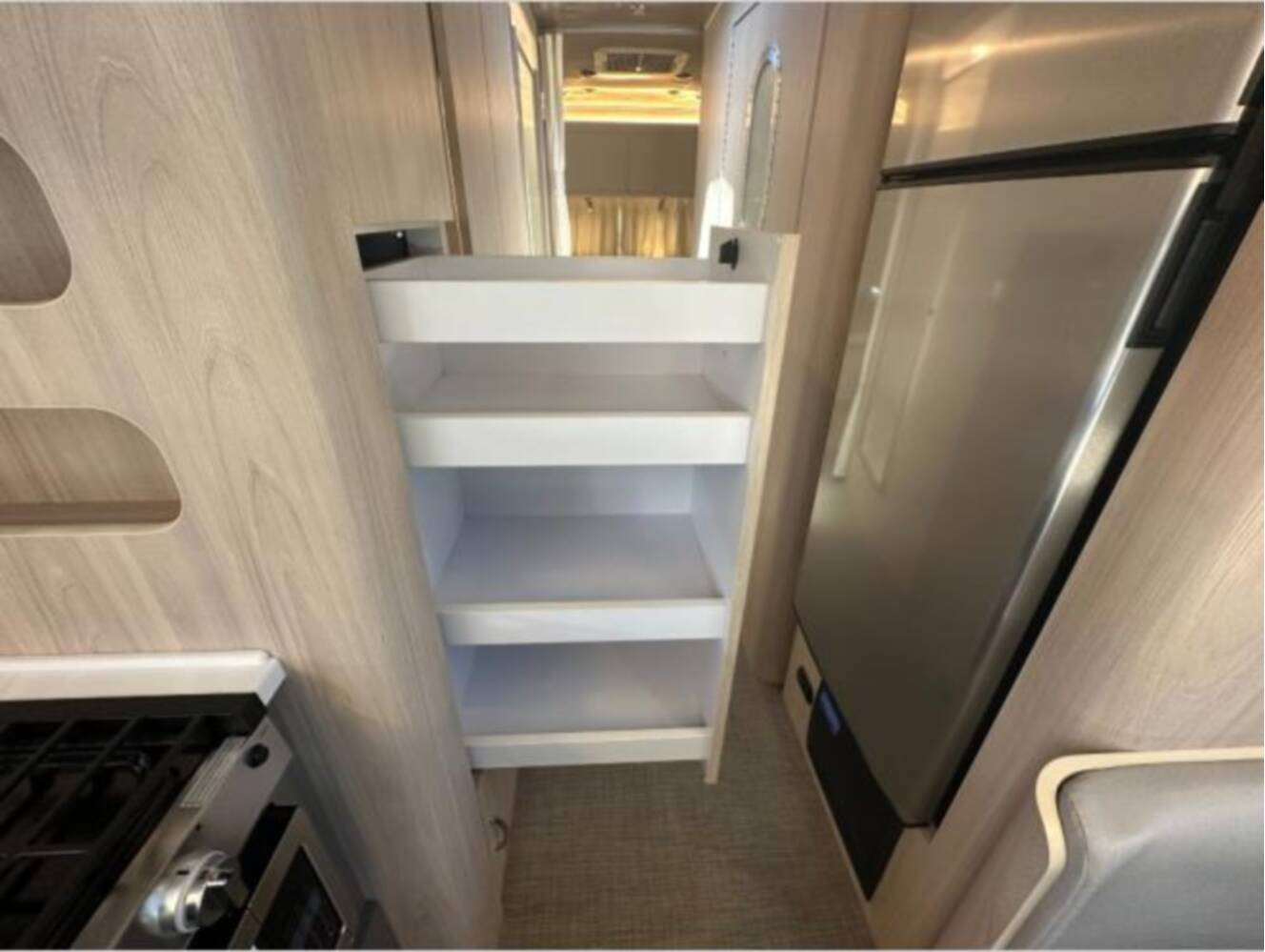 A photo of this 2026 Airstream Trade Wind 25FB Twin