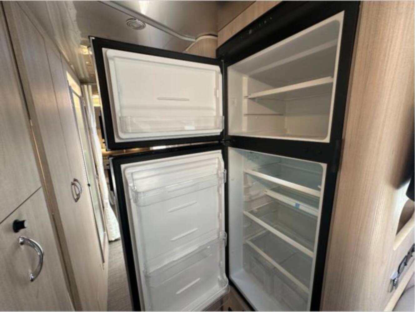 A photo of this 2026 Airstream Trade Wind 25FB Twin