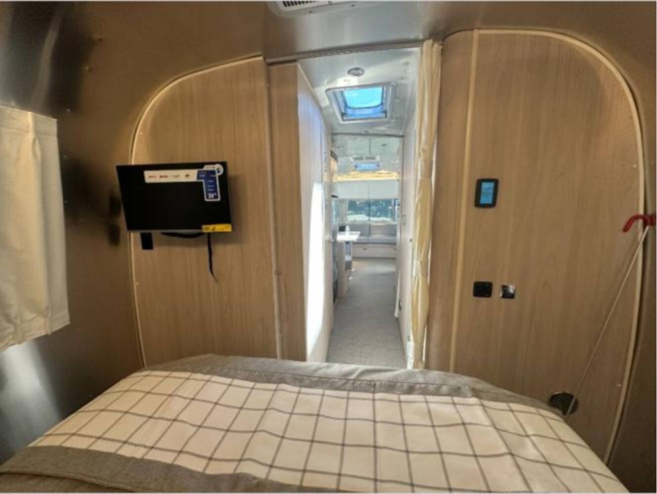 A photo of this 2026 Airstream Trade Wind 25FB Twin