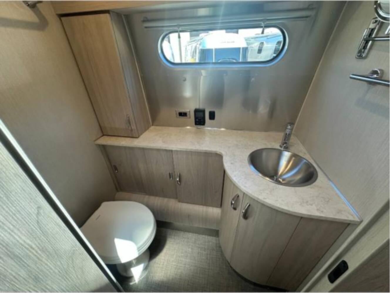 A photo of this 2026 Airstream Trade Wind 25FB Twin