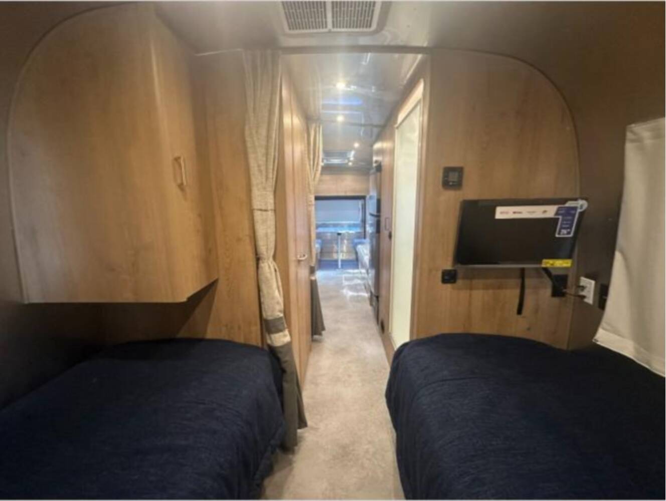 A photo of this 2027 Airstream Trade Wind 25FB Twin