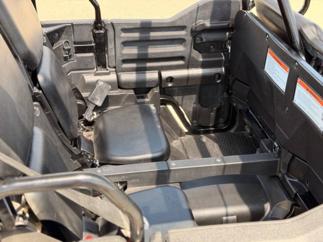 A photo of this 2021 Honda Pioneer 700-4 Deluxe Honda Phantom Camo