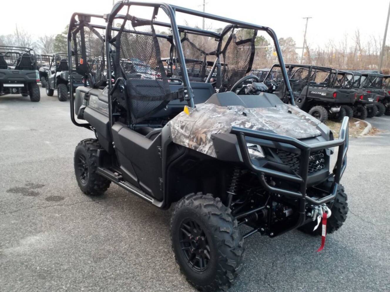 A photo of this 2026 Honda Pioneer 700-4 Forest