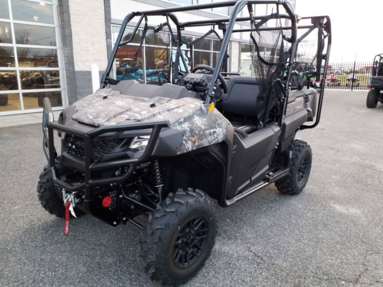 A photo of this 2026 Honda Pioneer 700-4 Forest
