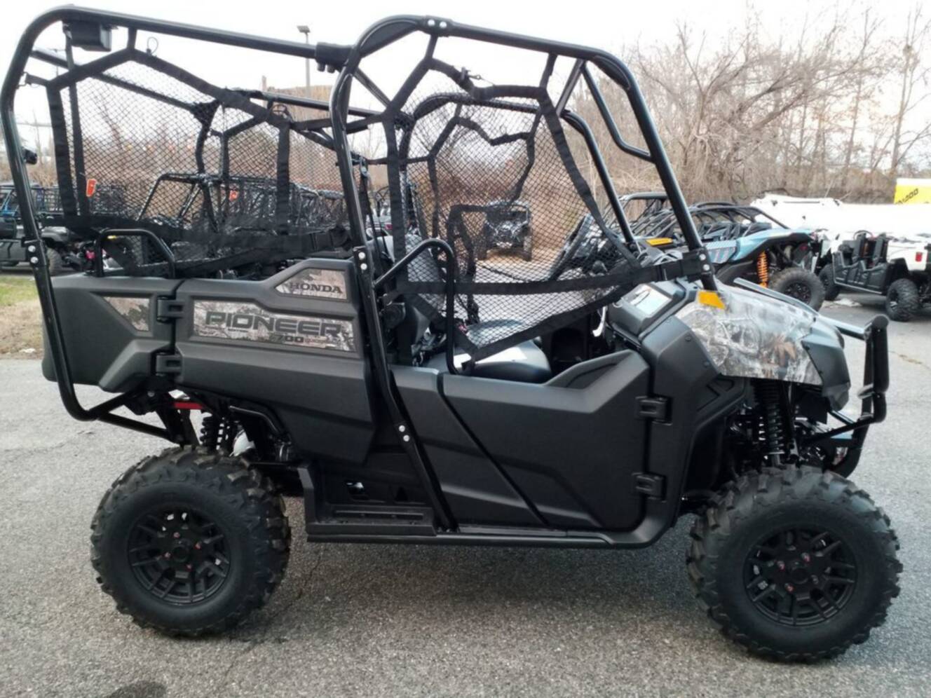 A photo of this 2026 Honda Pioneer 700-4 Forest