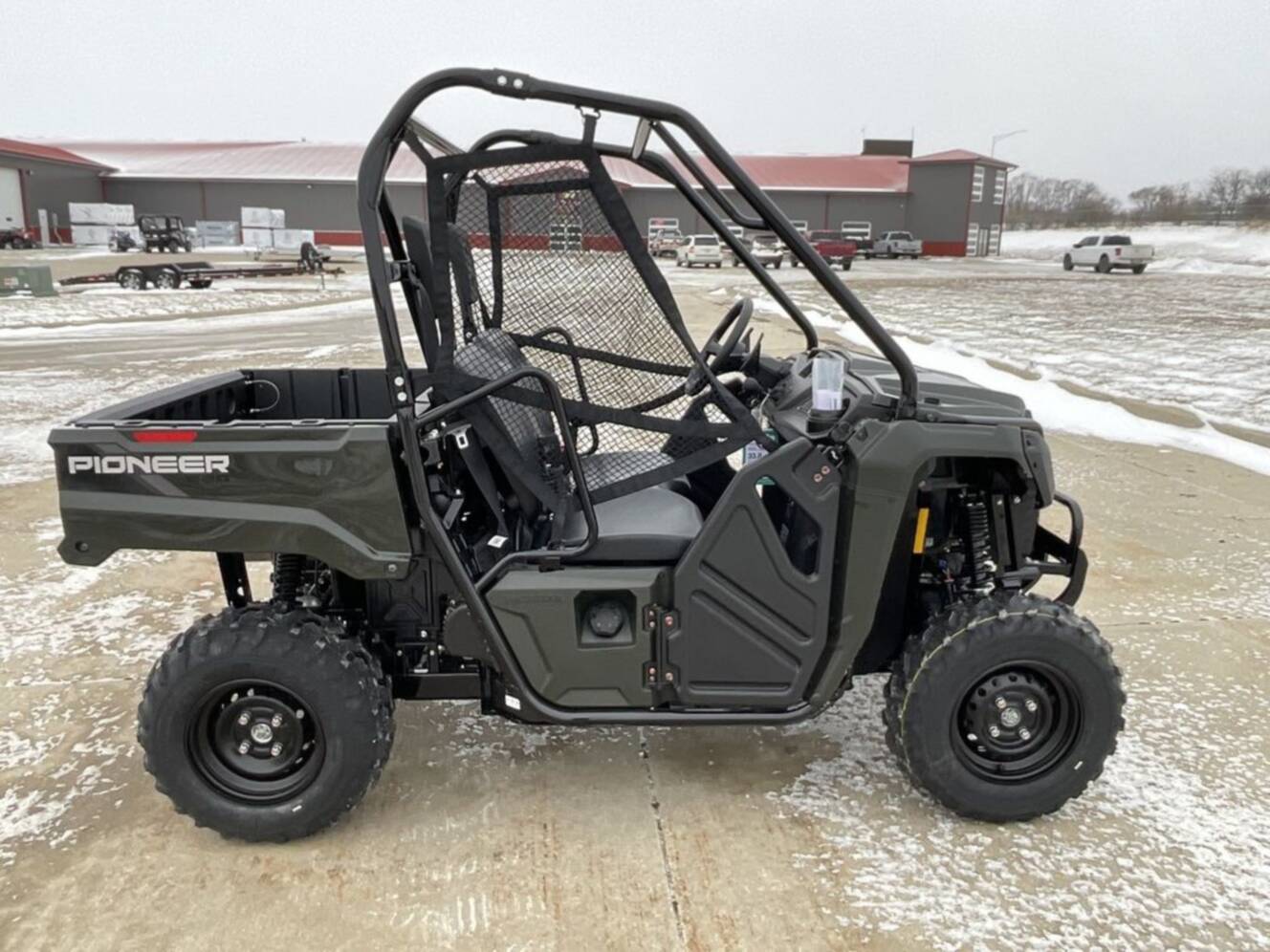 A photo of this 2026 Honda® PIONEER 520 Green