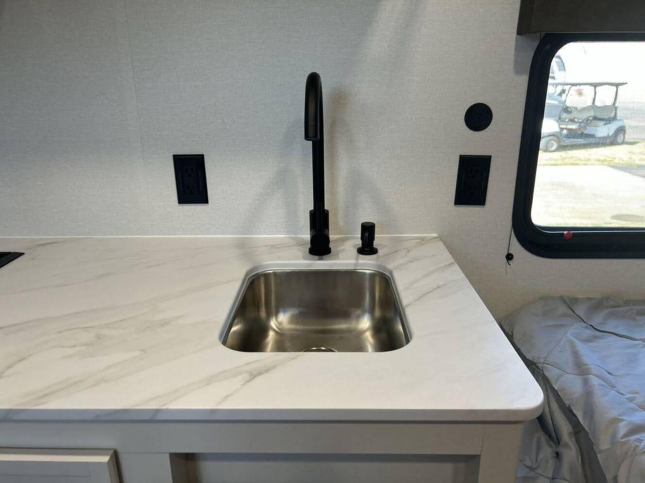 A photo of this 2027 Grand Design Transcend Lite 121RBL