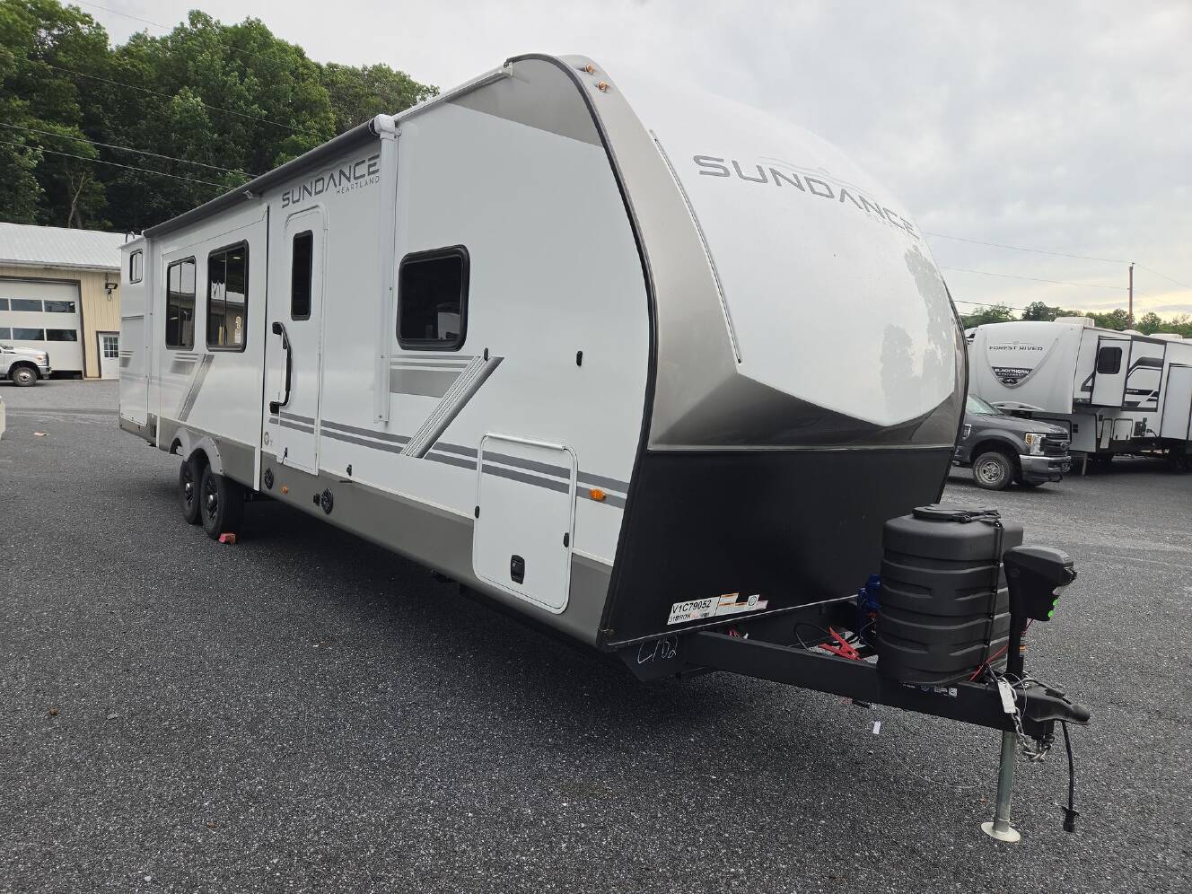 A photo of this 2027 Heartland Sundance Ultra-Lite 31BROK