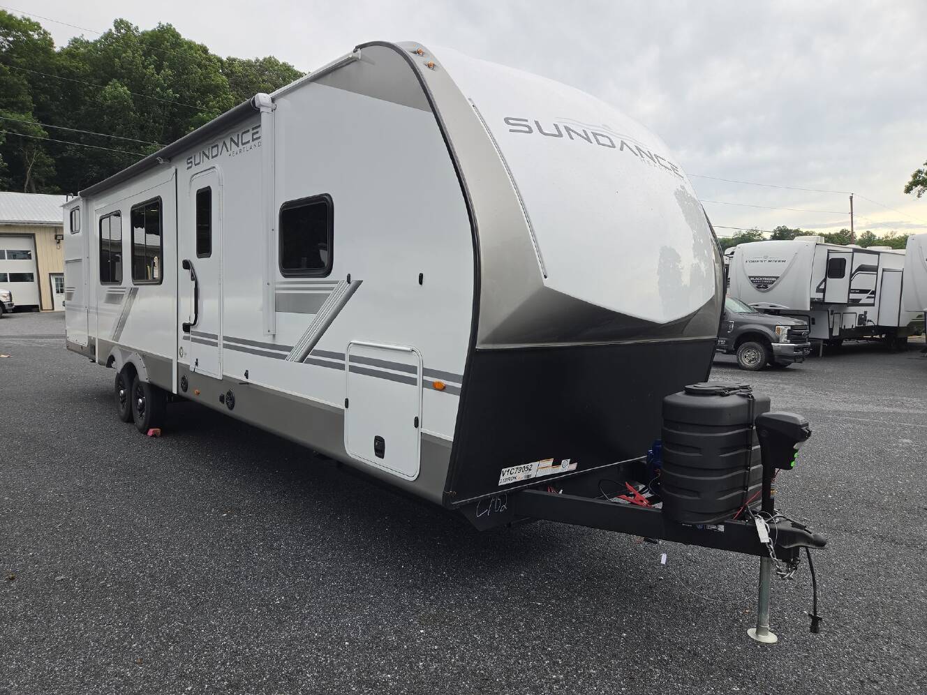 A photo of this 2027 Heartland Sundance Ultra-Lite 31BROK
