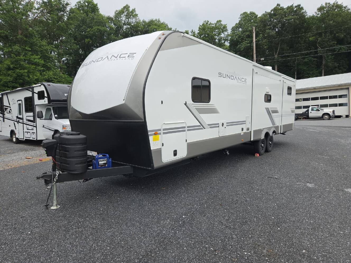 A photo of this 2027 Heartland Sundance Ultra-Lite 31BROK