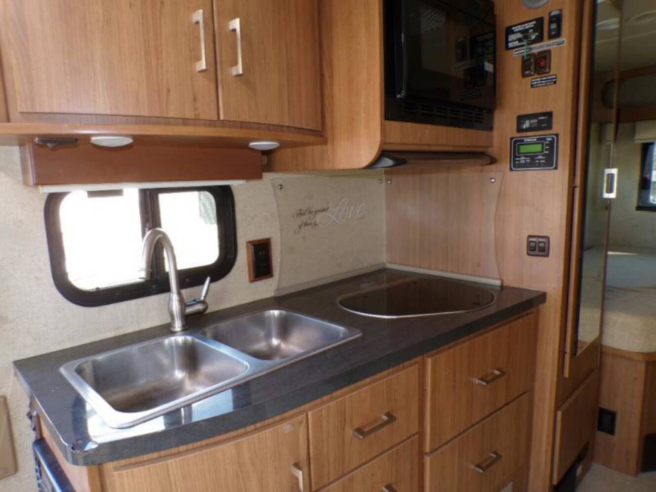 A photo of this 2015 Itasca Navion 24J