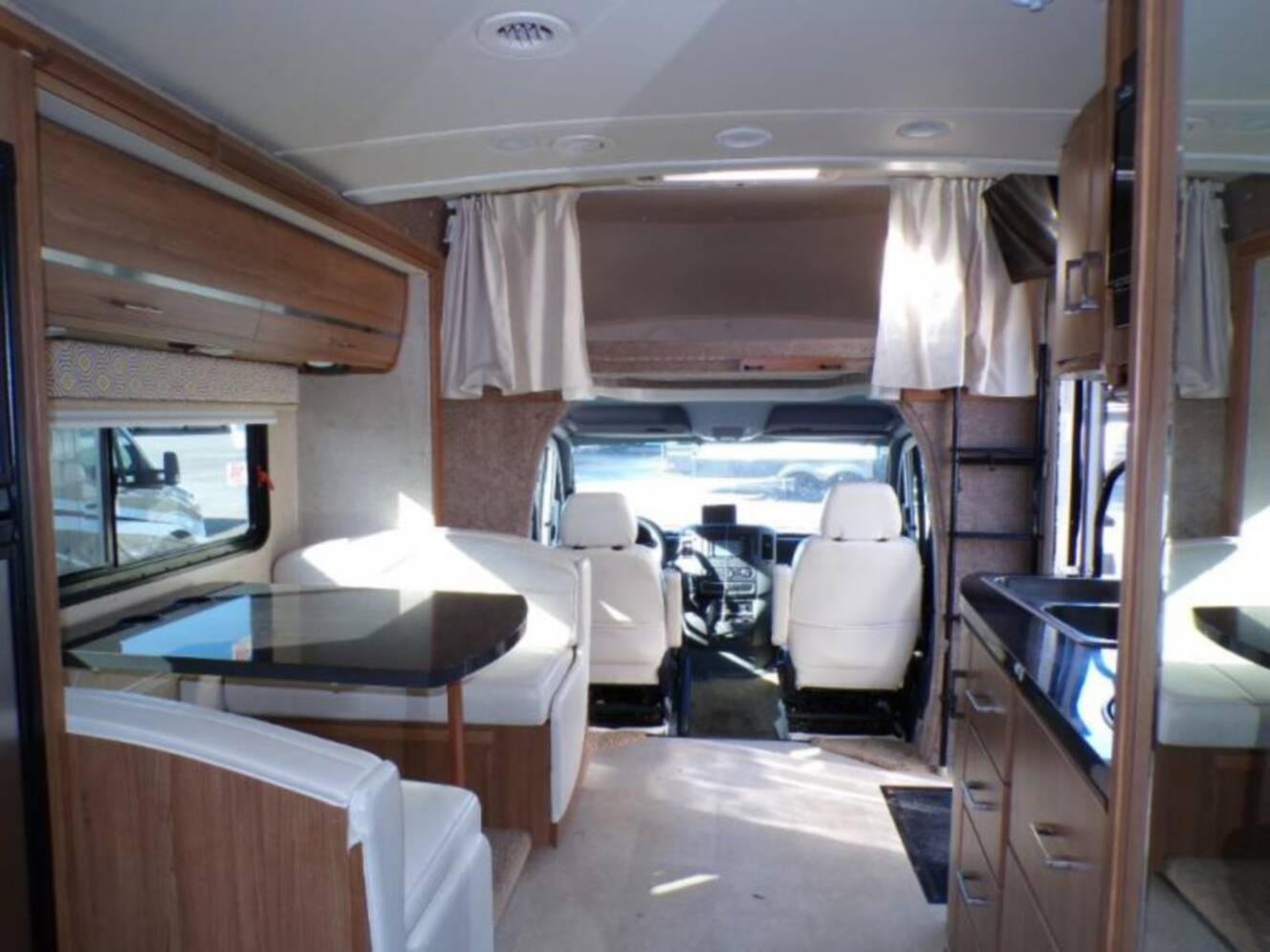 A photo of this 2015 Itasca Navion 24J