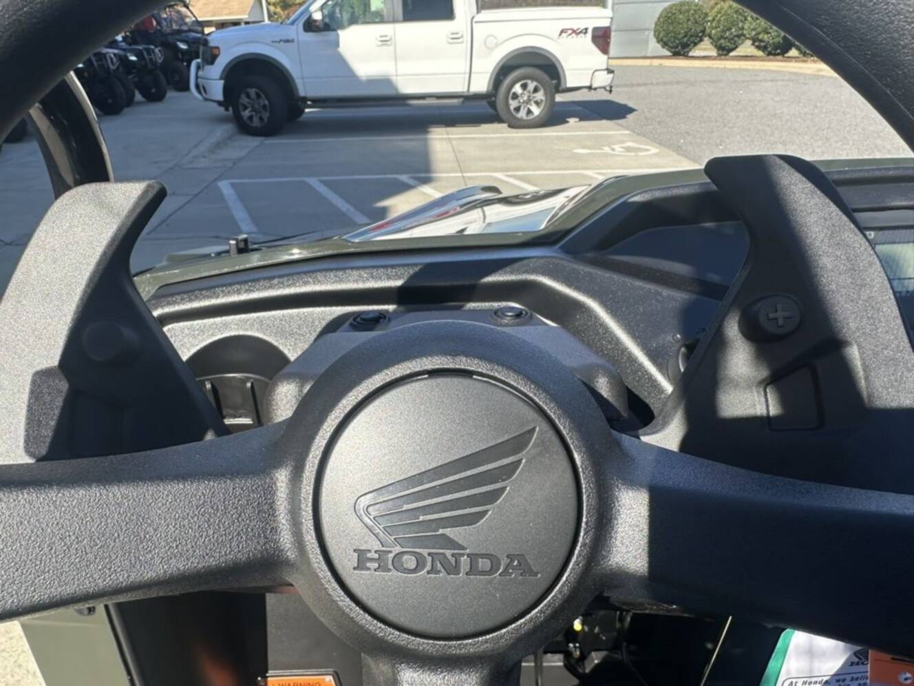 A photo of this 2026 Honda® Pioneer 520
