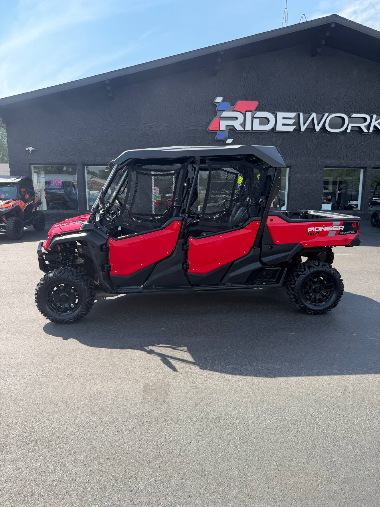 A photo of this 2023 Honda PIONEER 1000-6 CREW DELUXE