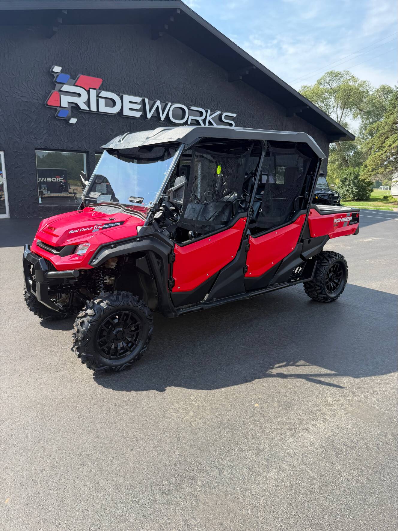 A photo of this 2023 Honda PIONEER 1000-6 CREW DELUXE