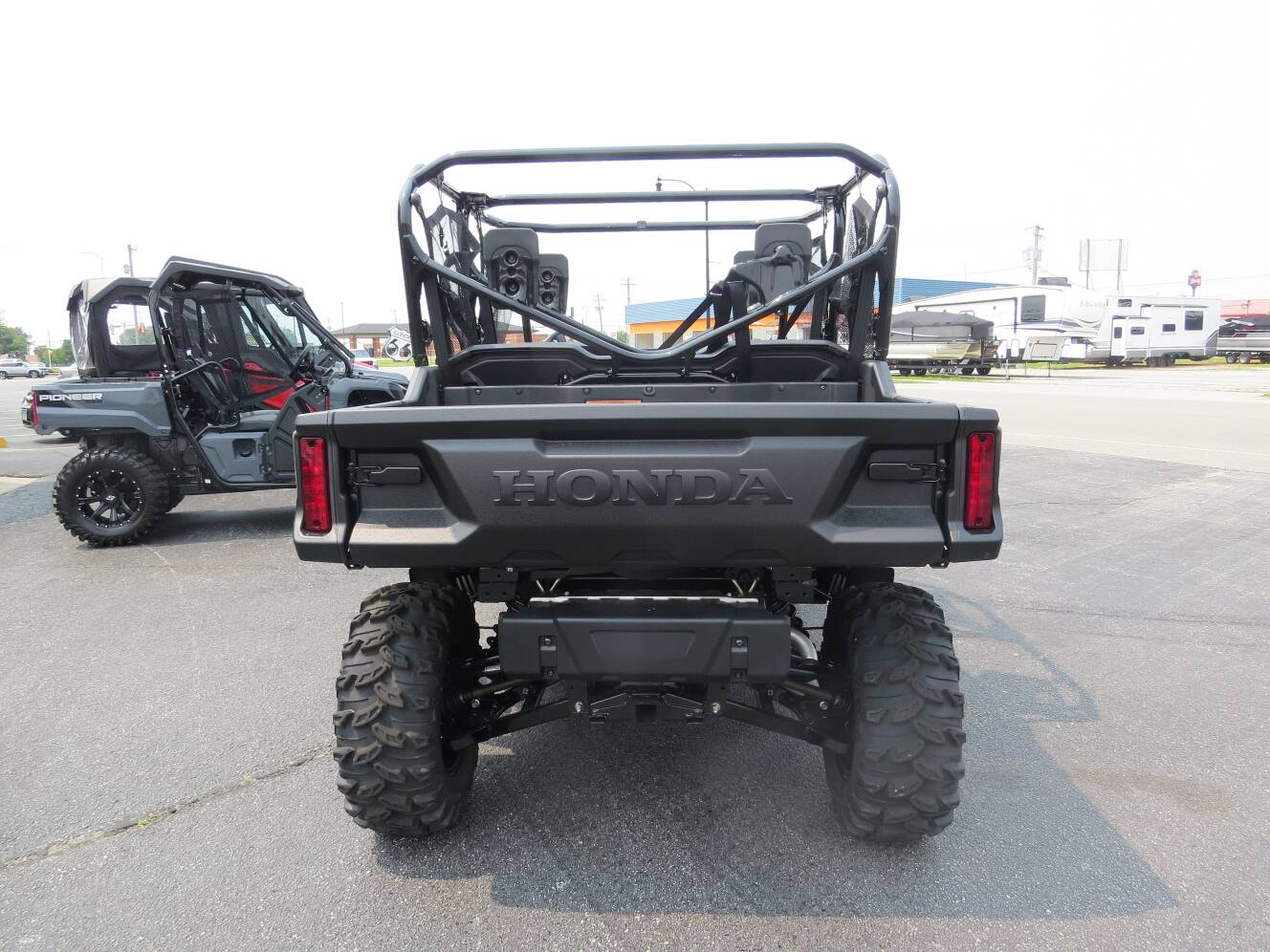 A photo of this 2025 Honda Pioneer 1000-6 Crew Deluxe