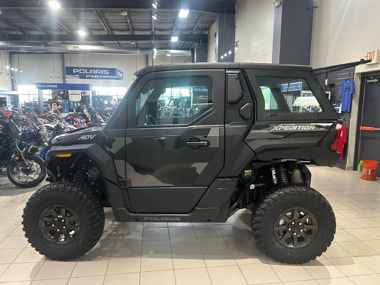 A photo of this 2026 Polaris XPEDITION ADV NORTHSTAR MATTE SUPER GRAPHITE