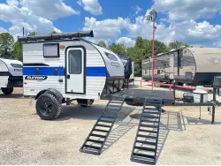 2022 Sunset Park RV Sunray 109E Hauler Sport With Bike Rack Lifted Outside
