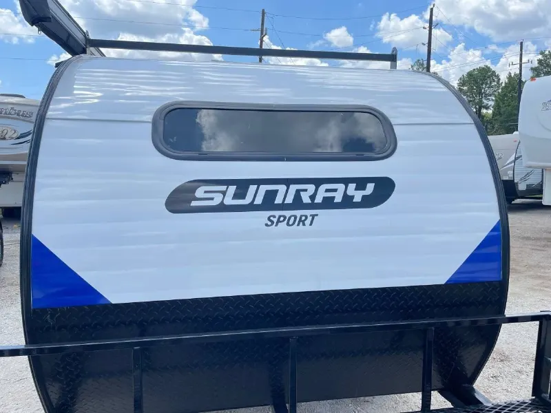 2022 Sunset Park RV Sunray 109E Hauler Sport With Bike Rack Lifted Outside