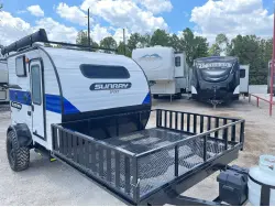 2022 Sunset Park RV Sunray 109E Hauler Sport With Bike Rack Lifted Outside