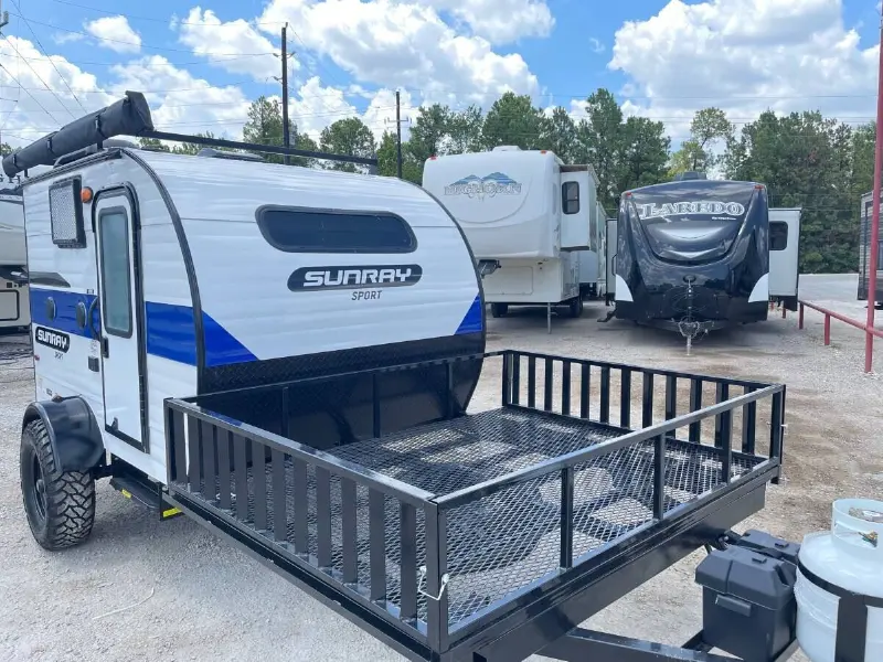 2022 Sunset Park RV Sunray 109E Hauler Sport With Bike Rack Lifted Outside