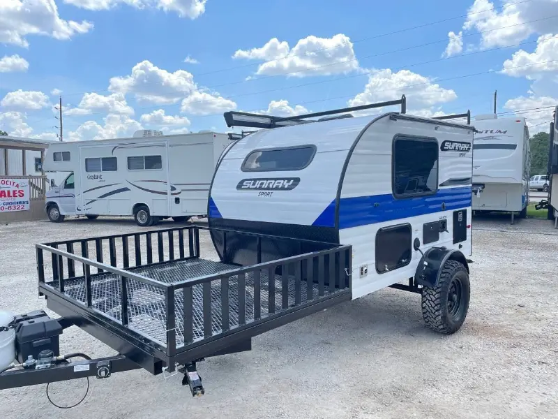 2022 Sunset Park RV Sunray 109E Hauler Sport With Bike Rack Lifted Outside