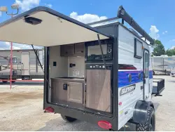 2022 Sunset Park RV Sunray 109E Hauler Sport With Bike Rack Lifted Outside