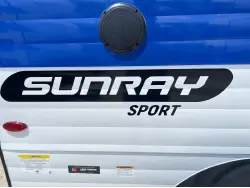 2022 Sunset Park RV Sunray 109E Hauler Sport With Bike Rack Lifted Outside