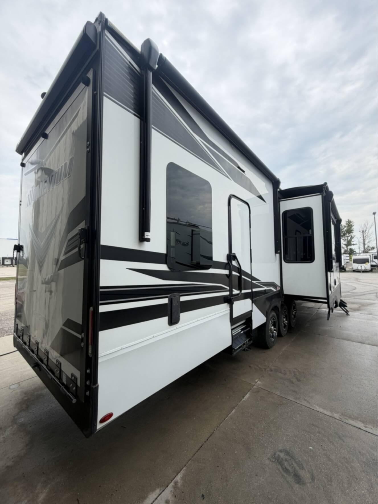 A photo of this 2023 Grand Design Momentum M-Class 397THS