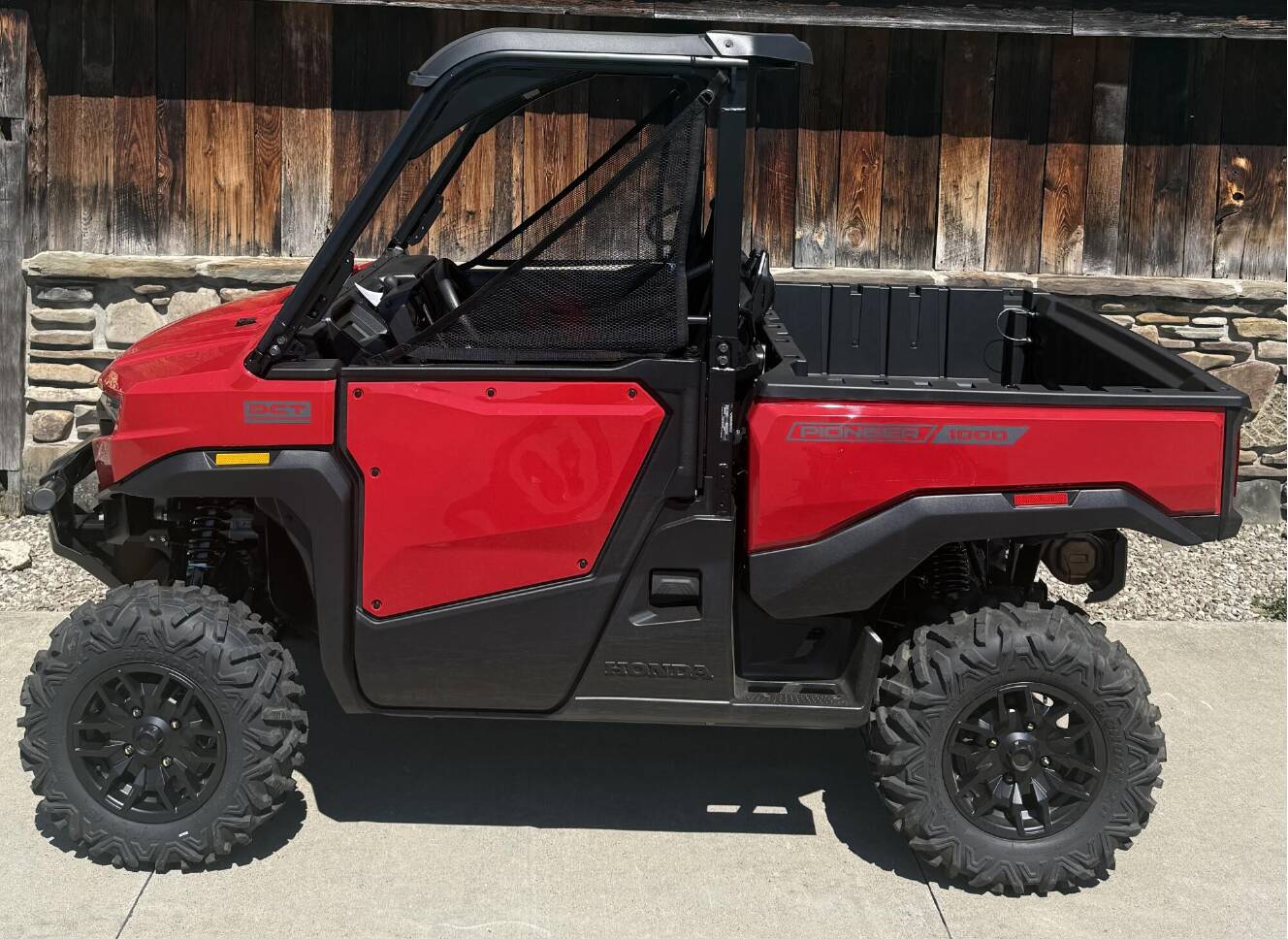 A photo of this 2026 Honda Pioneer 1000 Deluxe