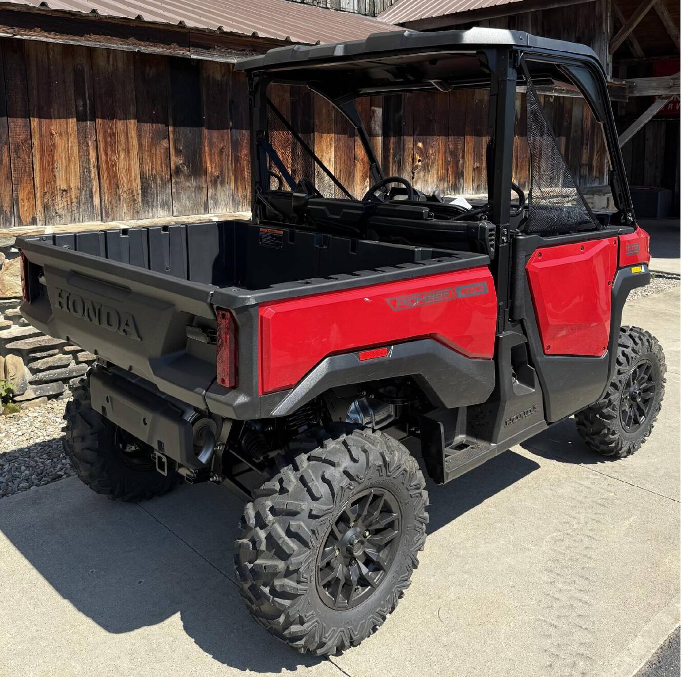 A photo of this 2026 Honda Pioneer 1000 Deluxe