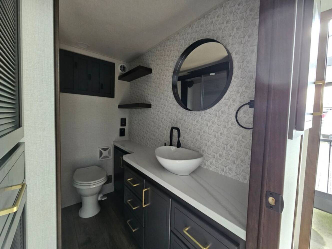 A photo of this 2026 Forest River Cedar Creek Cottage 41FWC