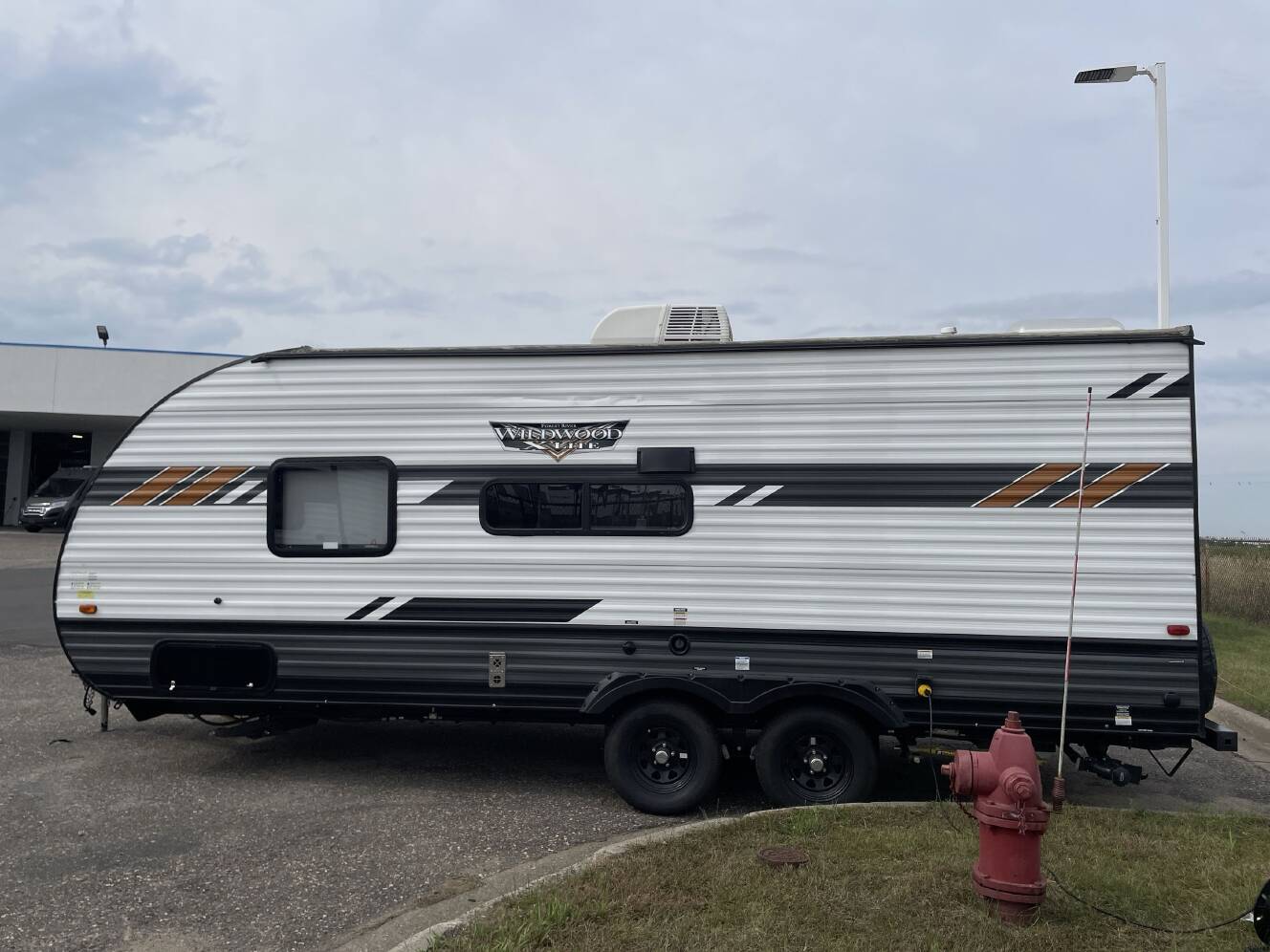 A photo of this 2022 Forest River WILDWOOD X-LITE 19DBXL