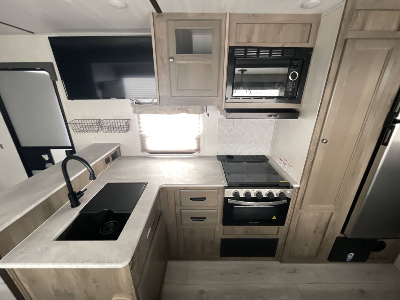 A photo of this 2022 Forest River SURVEYOR 276BHLE