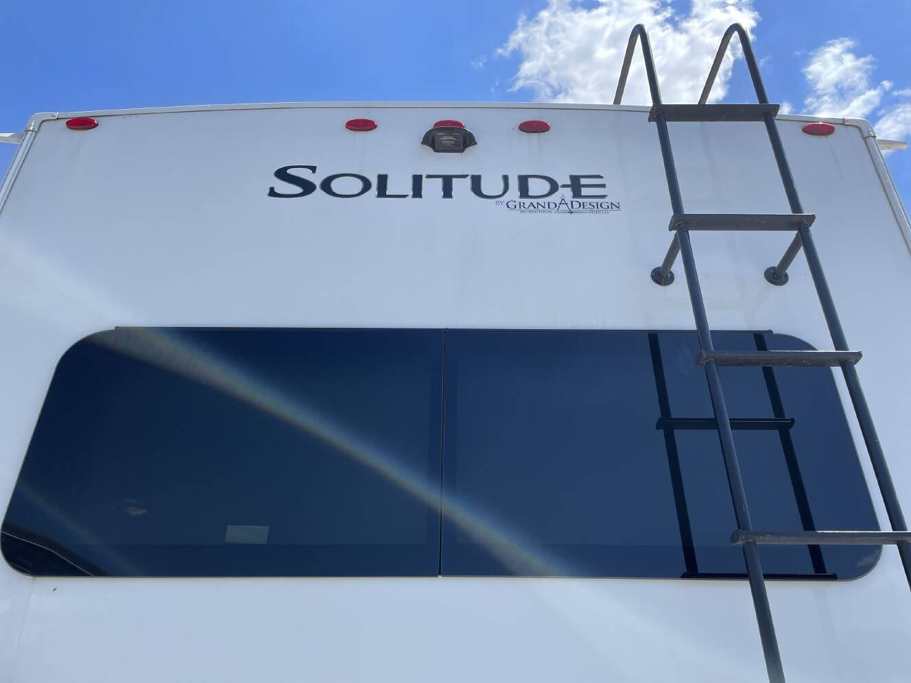 A photo of this 2023 Grand Design SOLITUDE 310GK