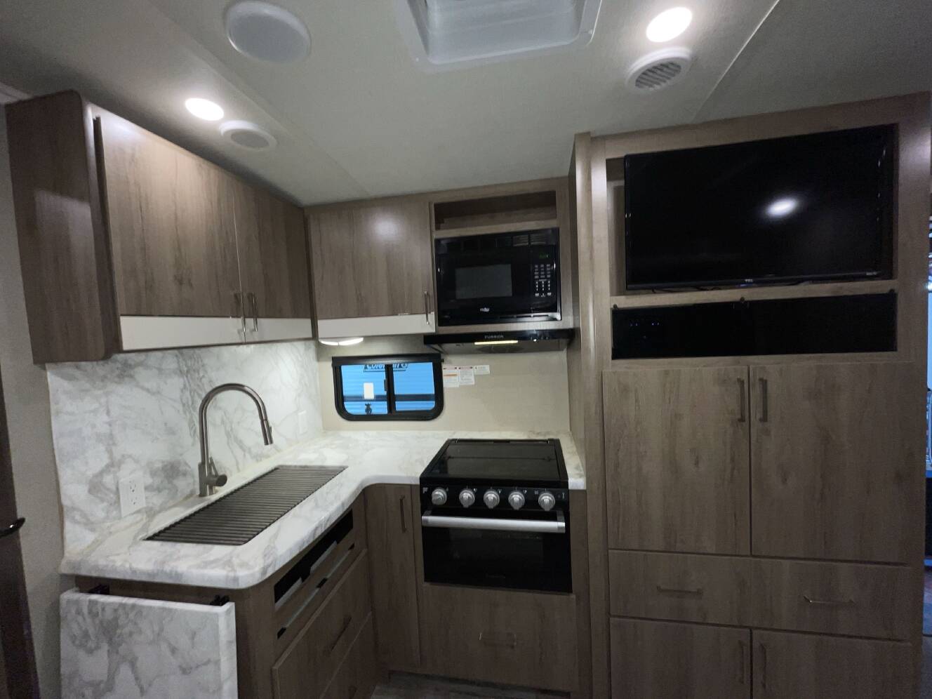 A photo of this 2023 Grand Design IMAGINE 2400BH