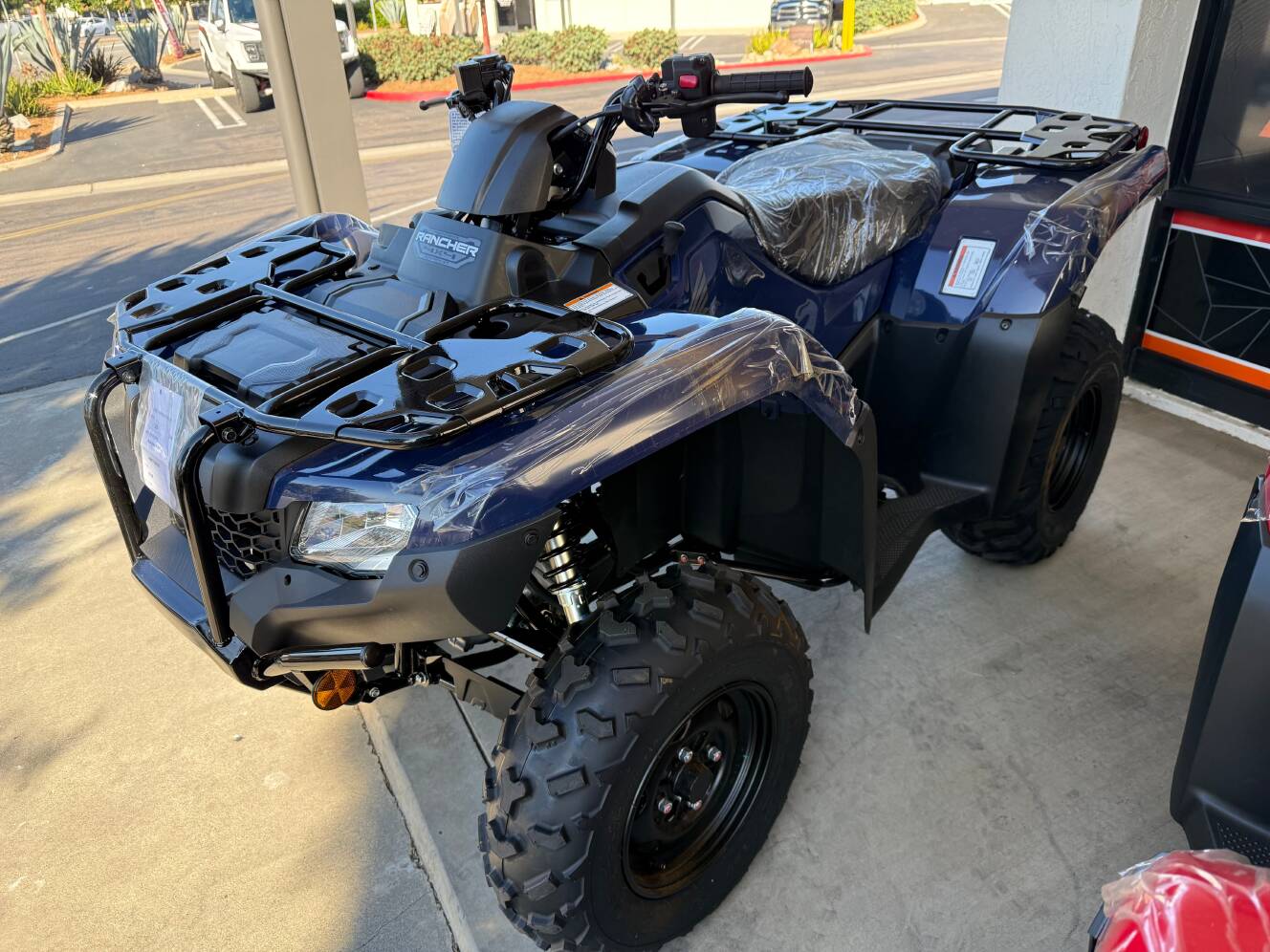 A photo of this 2025 Honda FOURTRAX RANCHER 4x4 AUTO DCT IRS EPS
