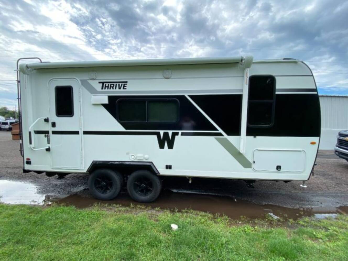 A photo of this 2027 Winnebago Thrive 18FBS