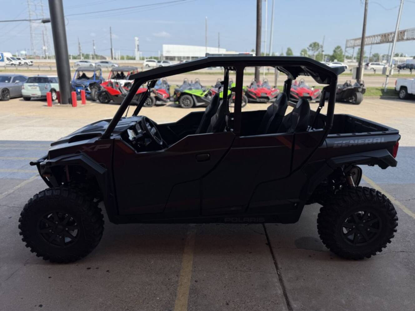 A photo of this 2026 Polaris GENERAL XP 4 1000 ULTIMATE SUPER GRAPHITE Ultimate